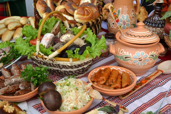 Ukrainian kitchen table eating treats — Stock Photo, Image