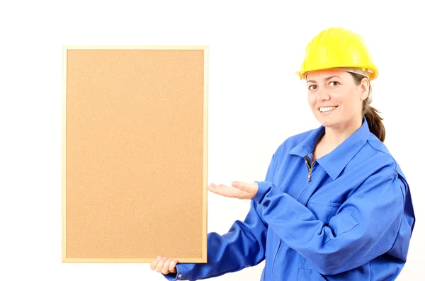 Vrouw ingenieur cork board in hand — Stockfoto