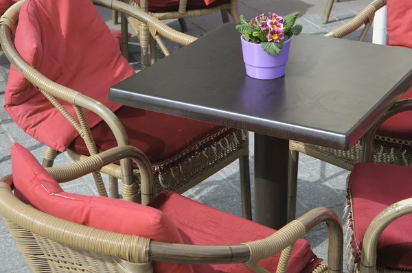 Open air cafe table and chairs — Stock Photo, Image