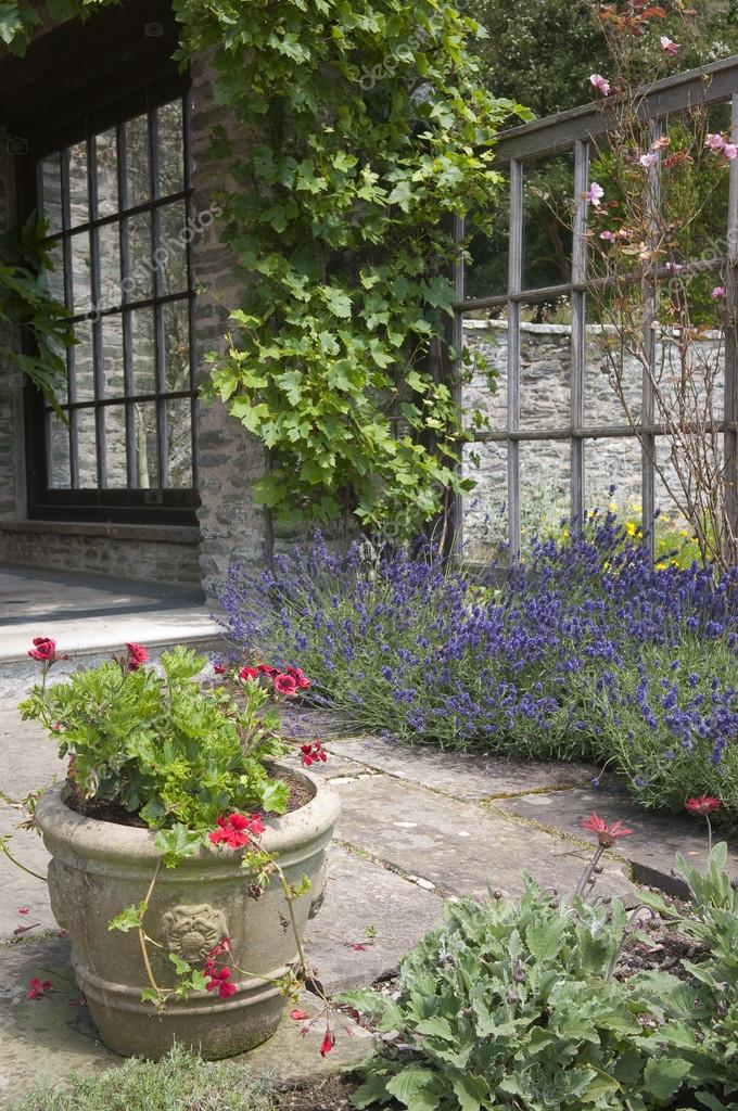 English garden patio Stock Photo by ©damnura 24285681