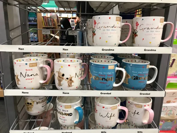 Auckland NZ 2 sep 22: Mugs for father\'s day beautiful cute decoration Best daddy in the world row of mugs and cups on shelves in bookstore