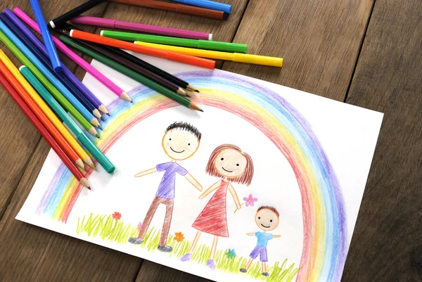 Kids drawing happy family — Stock Photo, Image