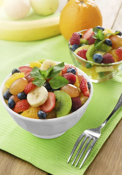 Sweet tasty fruit salad in the bowl — Stock Photo, Image