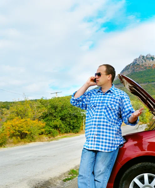 Adult man is calling to support — Stock Photo, Image