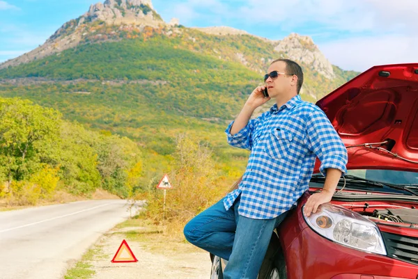 Adult man is calling to support — Stock Photo, Image