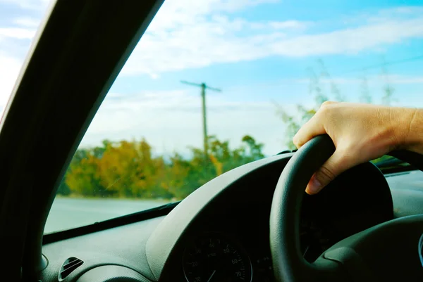 Adult man is driving his car — Stock Photo, Image
