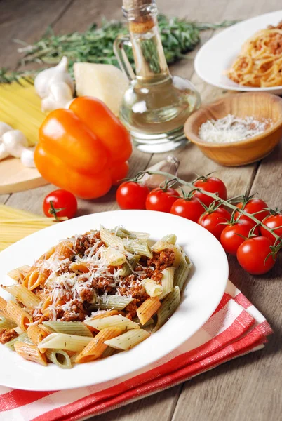 Pasta bolognese on the wooden table — Stock Photo, Image