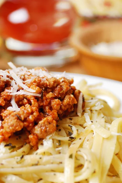 Pasta bolognese on the wooden table — Stock Photo, Image