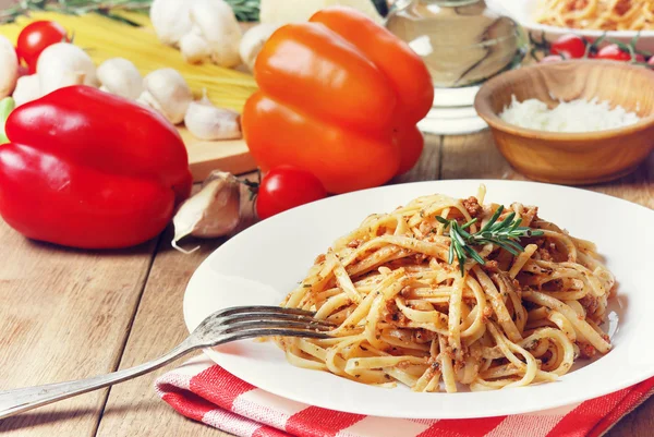 Pasta bolognese on the wooden table — Stock Photo, Image