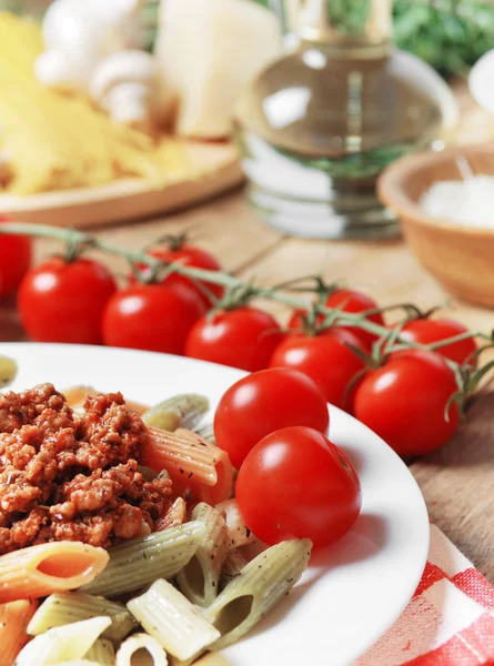 Pasta bolognese on the wooden table — Stock Photo, Image