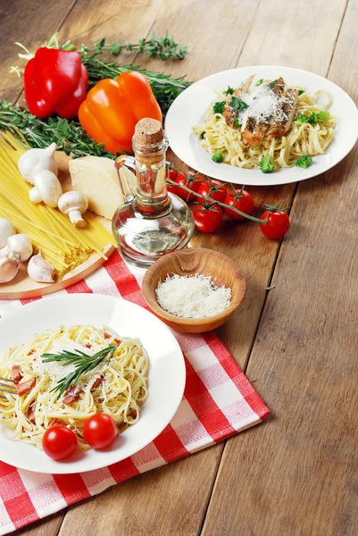 Pasta carbonara on the wooden table — Stock Photo, Image