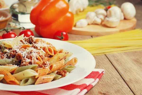 Pasta bolognese on the wooden table — Stock Photo, Image
