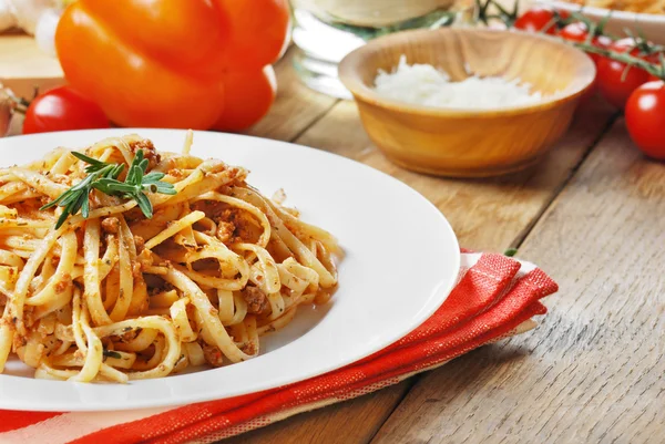 Pasta bolognese on the wooden table — Stock Photo, Image