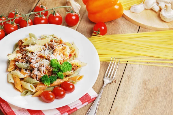 Pasta bolognese on the wooden table — Stock Photo, Image