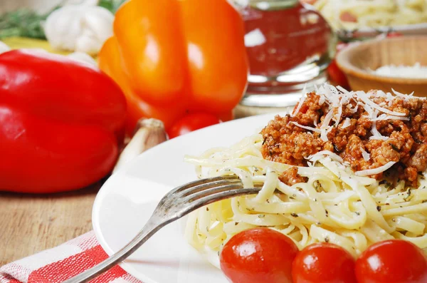 Pasta bolognese on the wooden table — Stock Photo, Image