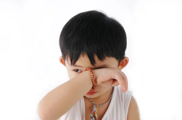 Asiatiska kid sömnig Stockbild