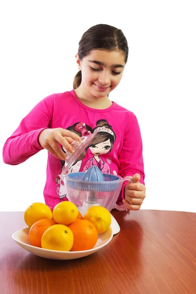 Girl and juicer — Stock Photo, Image