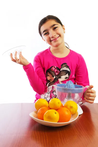 Girl and juicer — Stock Photo, Image