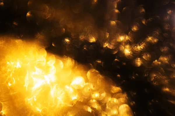 Soyut ve dekoratif arka plan ve altın sarısı ışıklar. Dünya dışı yaşam konsepti.