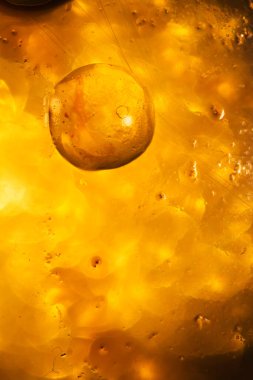 Soyut ve dekoratif arka plan ve altın sarısı ışıklar. Dünya dışı yaşam konsepti.