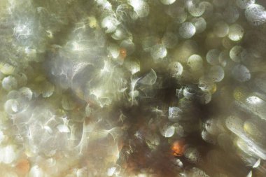 Soyut ve dekoratif arka plan ve altın sarısı ışıklar. Dünya dışı yaşam konsepti.