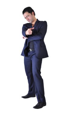 takım elbiseyle dans eden genç işadamı.