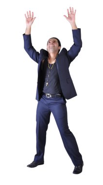 takım elbiseyle dans eden genç işadamı.