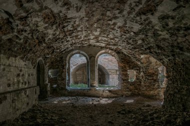 Brick ruins and ruined rooms of old fortification fort outpost. Popular monument of military history and travel destination, Tarakaniv, Ukraine