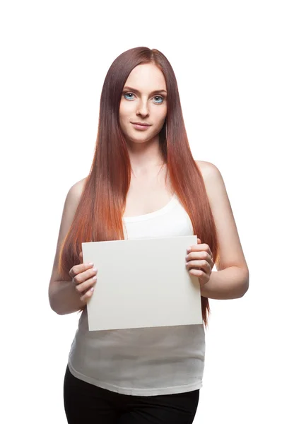 Female in casual outfit holding sign — Stock Photo, Image