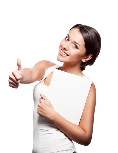 Young smiiling casual brunette caucasian girl holding sign — Stock Photo, Image