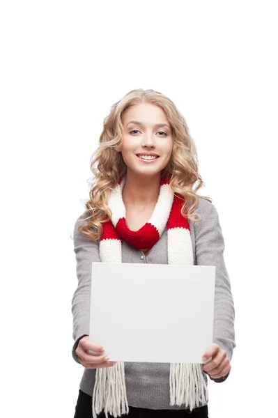 Joven mujer sonriente sosteniendo cartel — Foto de Stock