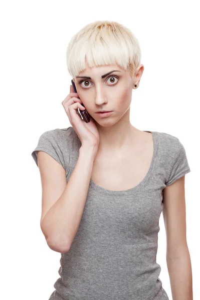 आकस्मिक सुनहरे बालों वाली लड़की सेल फोन पकड़े हुए — स्टॉक फ़ोटो, इमेज