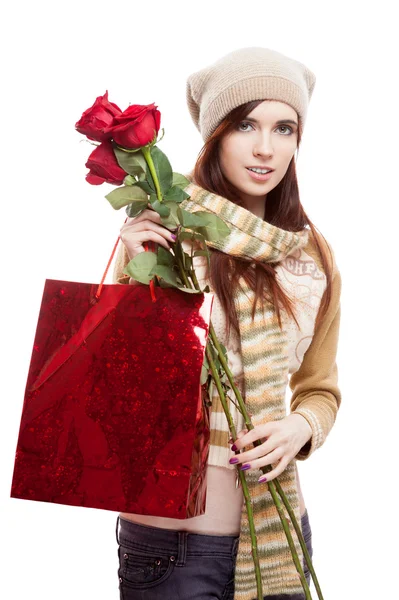 Girl holding red shopping bag — Stock Photo, Image