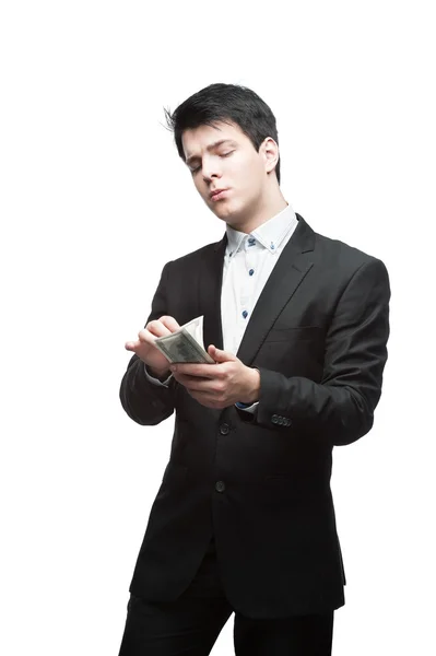 Young funny business man holding money — Stock Photo, Image