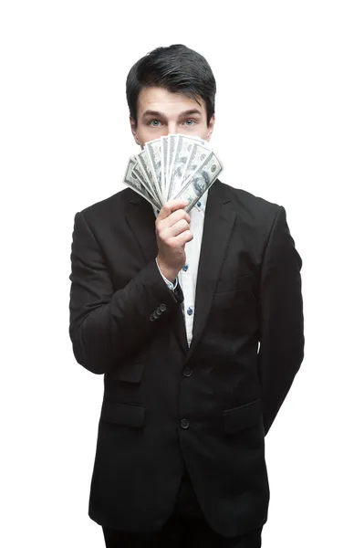 Jovem homem de negócios engraçado segurando dinheiro — Fotografia de Stock