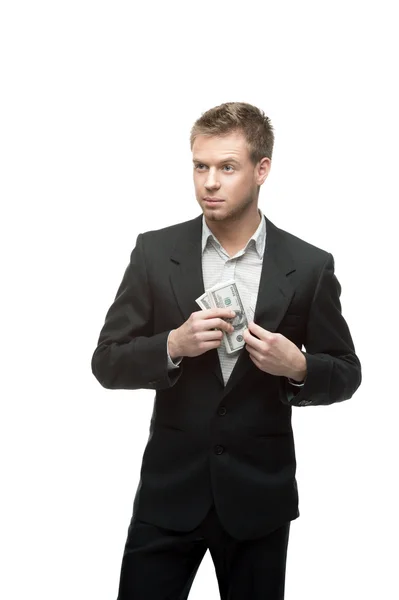 Young successful businessman holding money — Stock Photo, Image