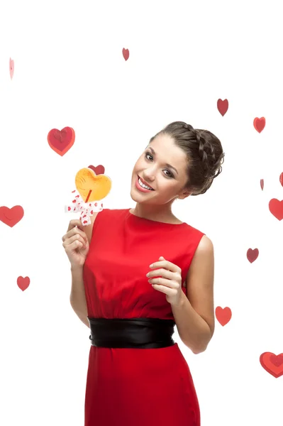 Young cheerful woman holding lollipop — Stock Photo, Image