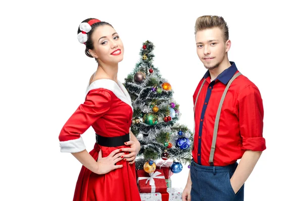 Happy retro couple near christmas tree — Stock Photo, Image