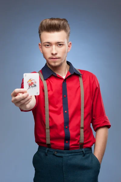Retro man holding Jocker card — Stock Photo, Image