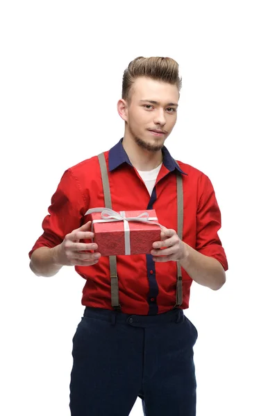 Cheerful retro man holding gift — Stock Photo, Image