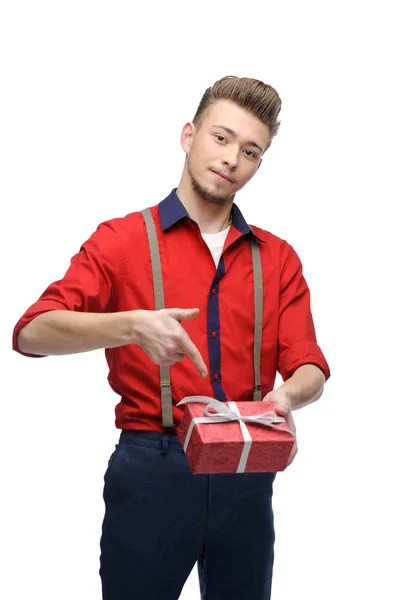 Cheerful retro man holding gift — Stock Photo, Image