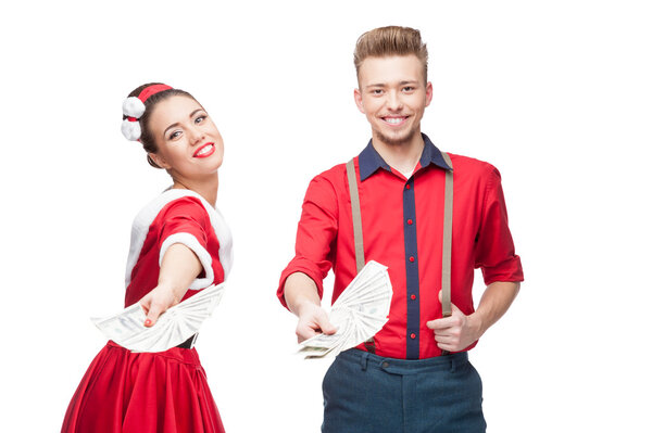 Young retro couple holding money