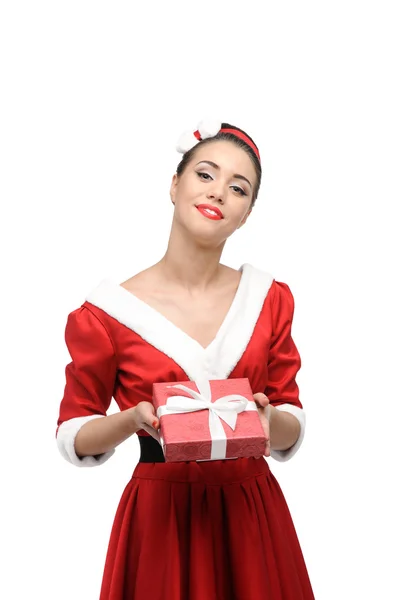 Cheerful retro girl holding christmas gift — Stock Photo, Image