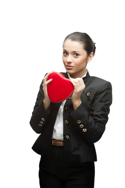 Young business woman holding red heart — Stock Photo, Image