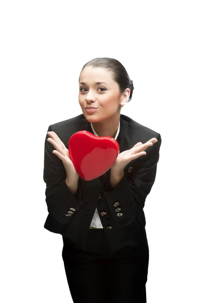 Young business woman holding red heart Stock Photo