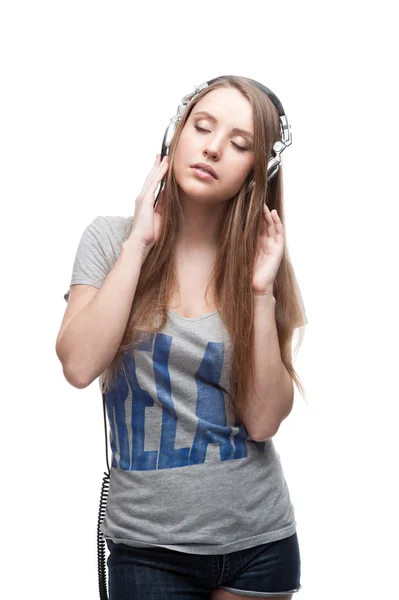 Chica de música casual en blanco — Foto de Stock