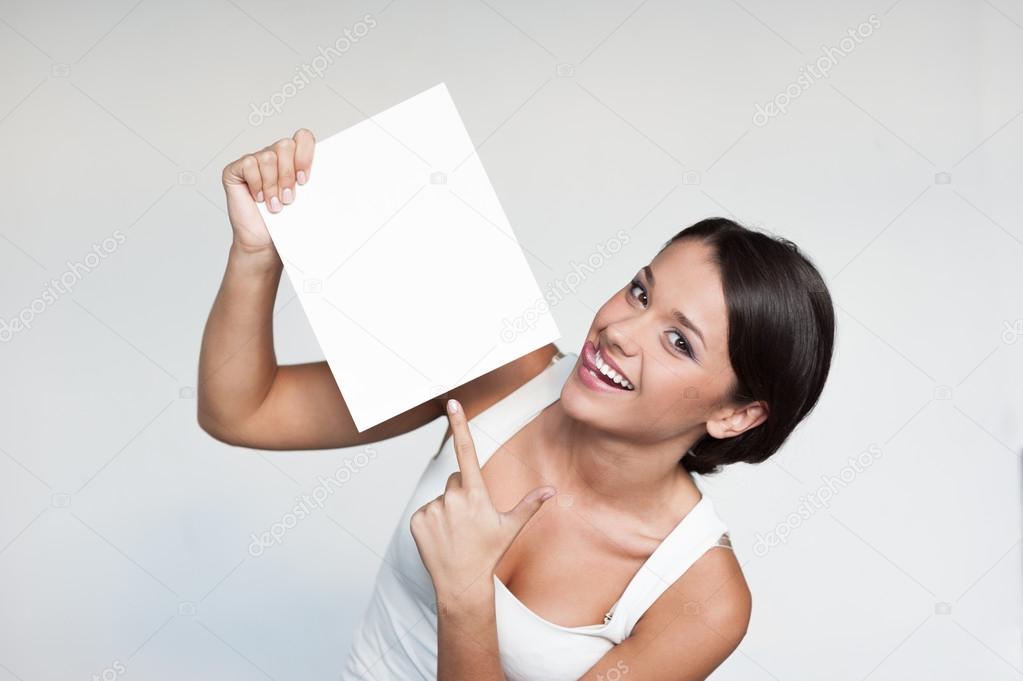 cheerful girl holding sign