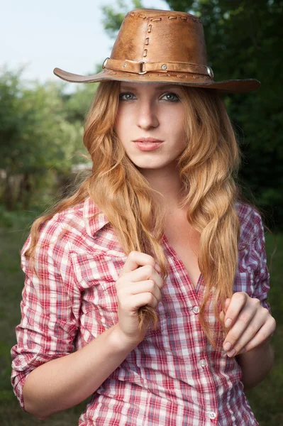 Červené vlasy cowgirl — Stock fotografie