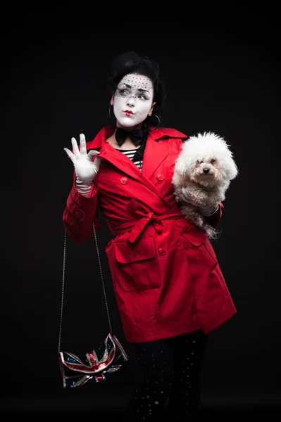 Woman mime with puppy — Stock Photo, Image