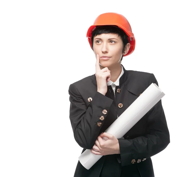 Thoughtful engineer woman holding sign — Zdjęcie stockowe